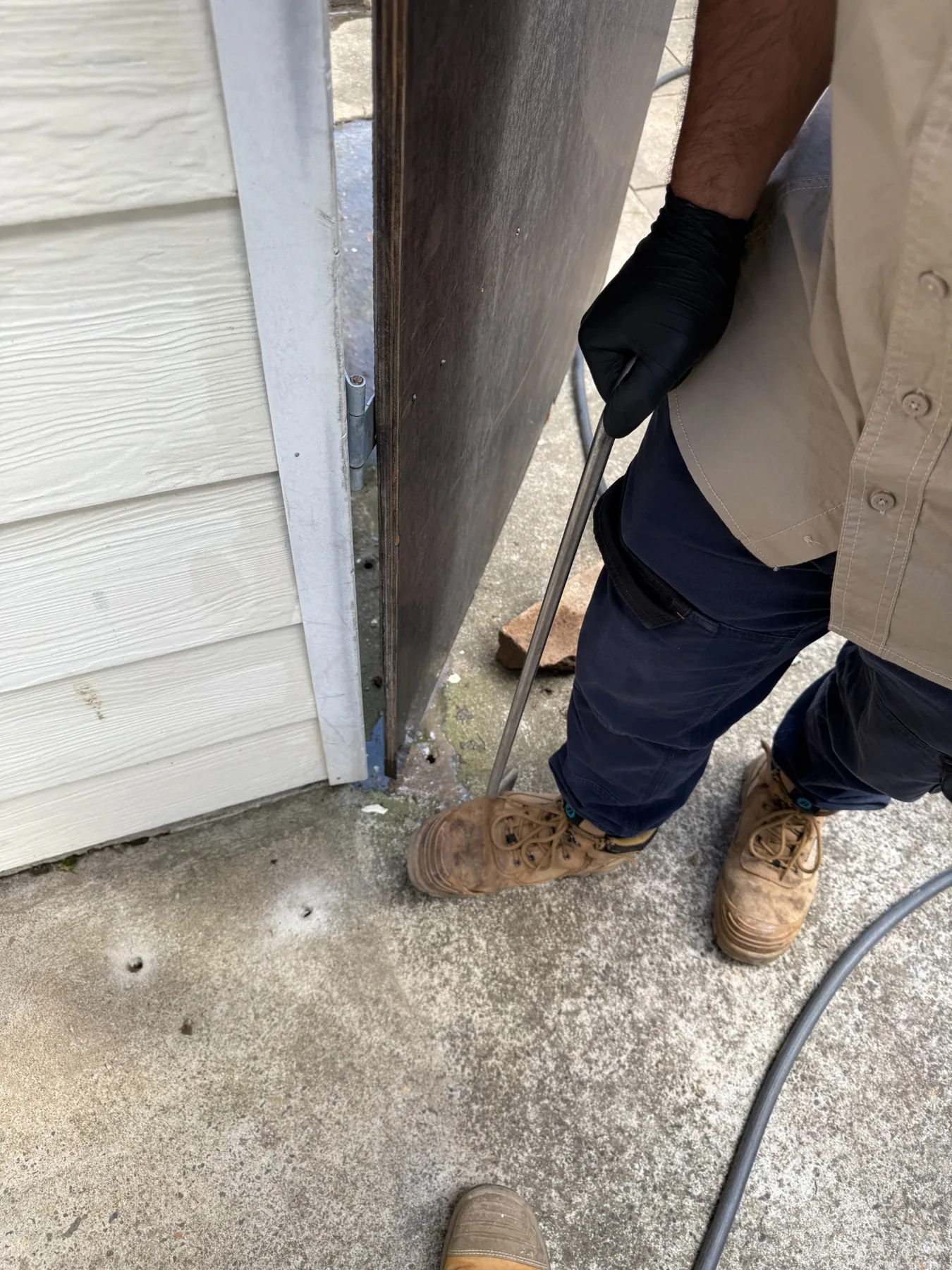 Concrete injection work as part of a chemical termite barrier installation